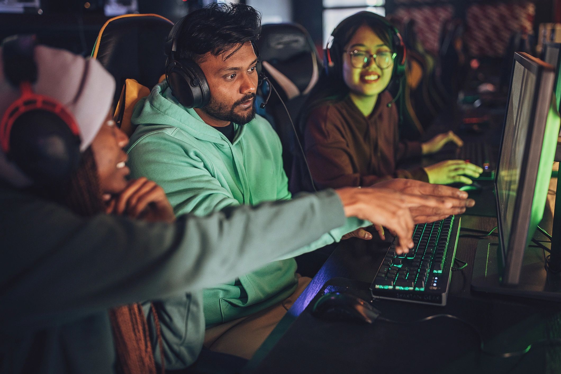 Gamers discussing video game strategy together